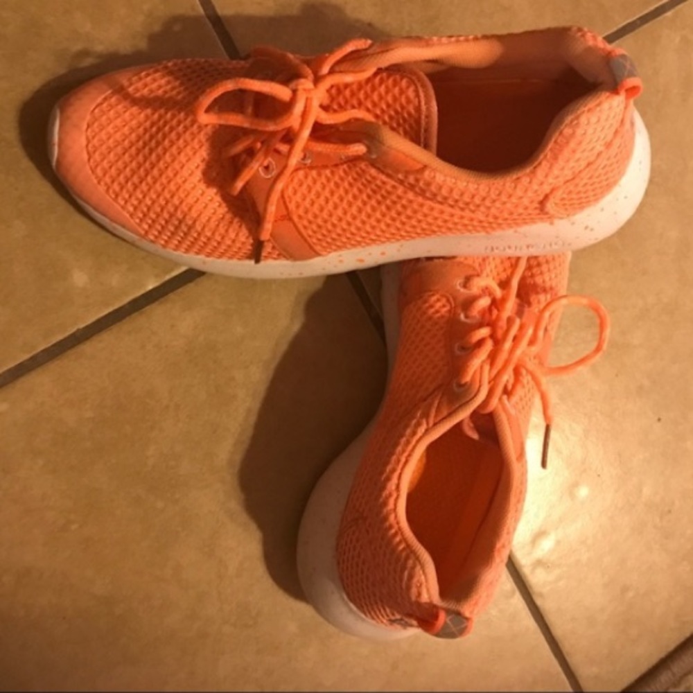 Orange running shoes